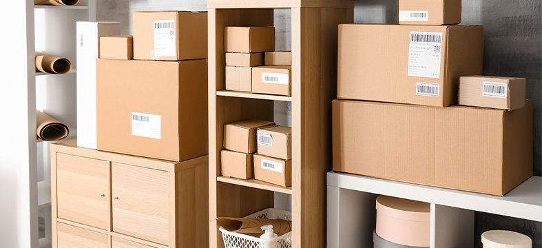 various cardboard packages on a shelf